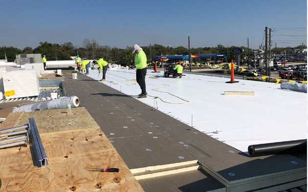 TPO flat roof commercial crew installation